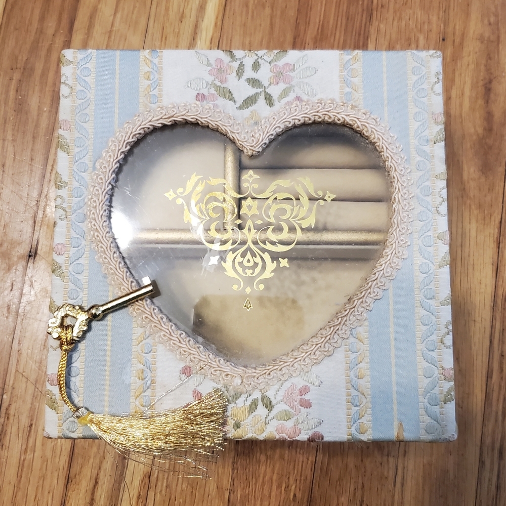 Lovely Schmid locking jewelry music box
